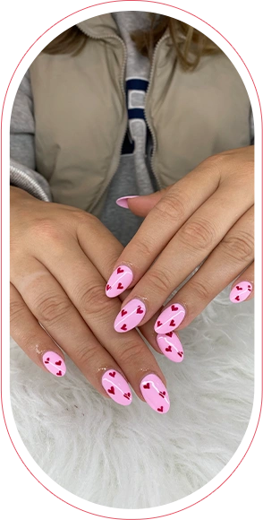 Pink manicure with heart design