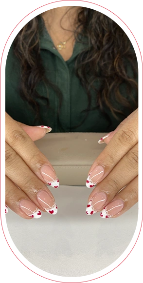 Young woman with nail design heart